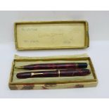 A lady's Conway Stewart Dinkie pen and pencil set with 14ct gold nib, boxed