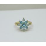 A 9ct gold, aquamarine and topaz cluster ring, 2.8g, T