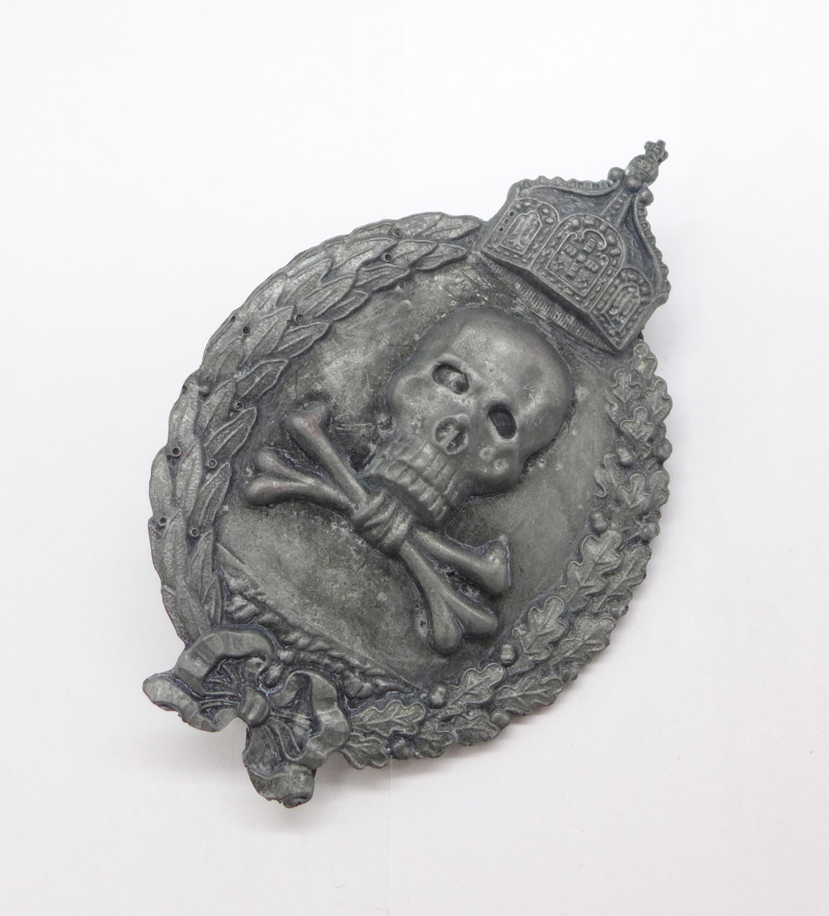 A WWI Imperial German skull and bones badge
