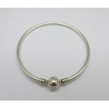 A silver Pandora bangle