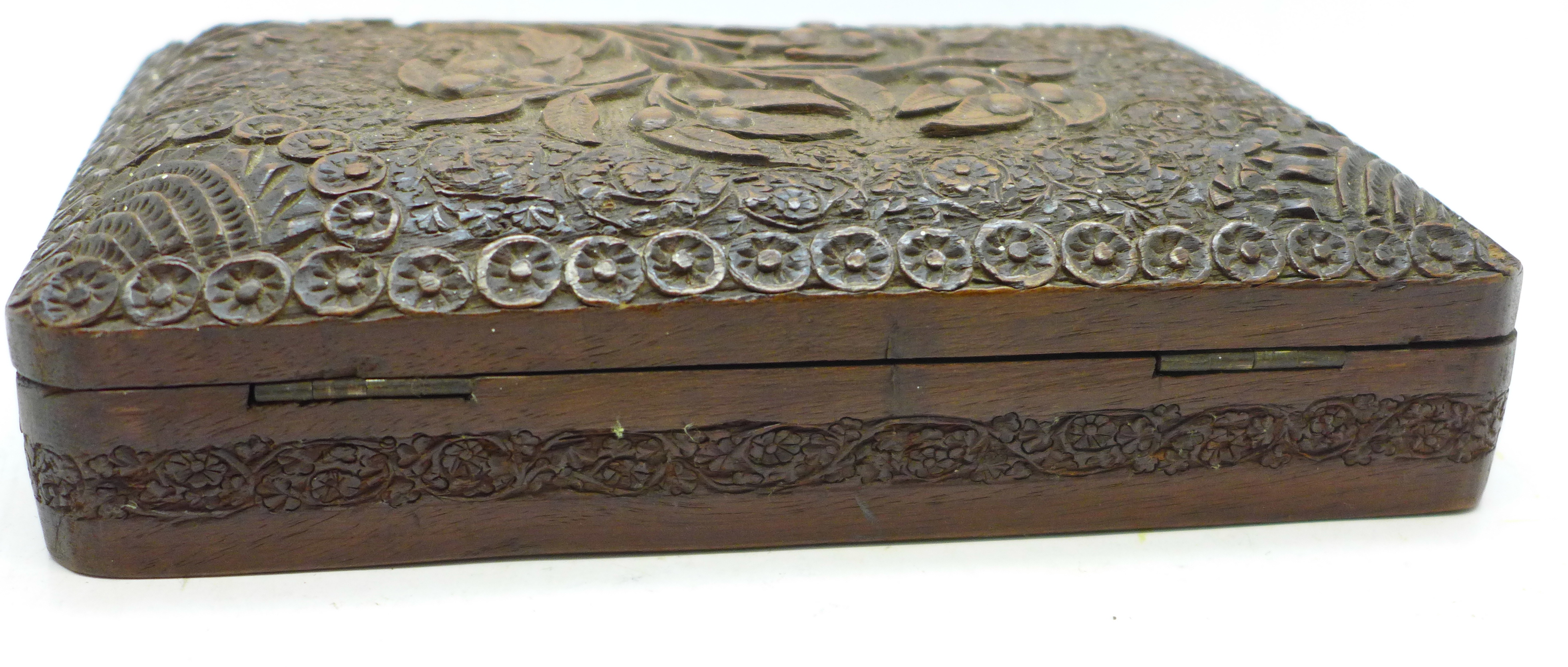 A heavily carved wooden box - Image 4 of 4