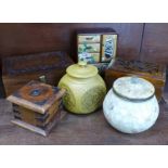 Three wooden boxes, a small chest and two lidded jars