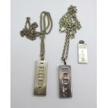 Three silver ingot pendants and two chains, 102g