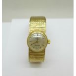 A lady's 9ct gold Omega Ladymatic wristwatch, total weight with movement 30g