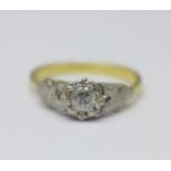 An 18ct gold and white metal set diamond ring, 2.4g, L