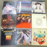 Twenty-four LP records and 12" singles, mainly 1980's including Rod Stewart, Status Quo, The Who,