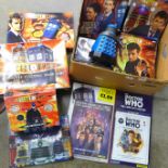 A collection of vintage Doctor Who merchandise and games, including a radio controlled Dalek