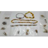 Silver and amber set jewellery, an amber necklace and an amber bracelet