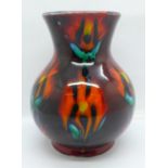 Anita Harris Pottery, Trojan vase decorated with iris flowers on an oxblood ground, Anita Harris