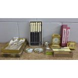 A collection of flatware including Stay Brite spoons, mainly boxed, a quartz carriage clock and