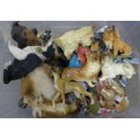 A collection of china dog figures **PLEASE NOTE THIS LOT IS NOT ELIGIBLE FOR POSTING AND PACKING**