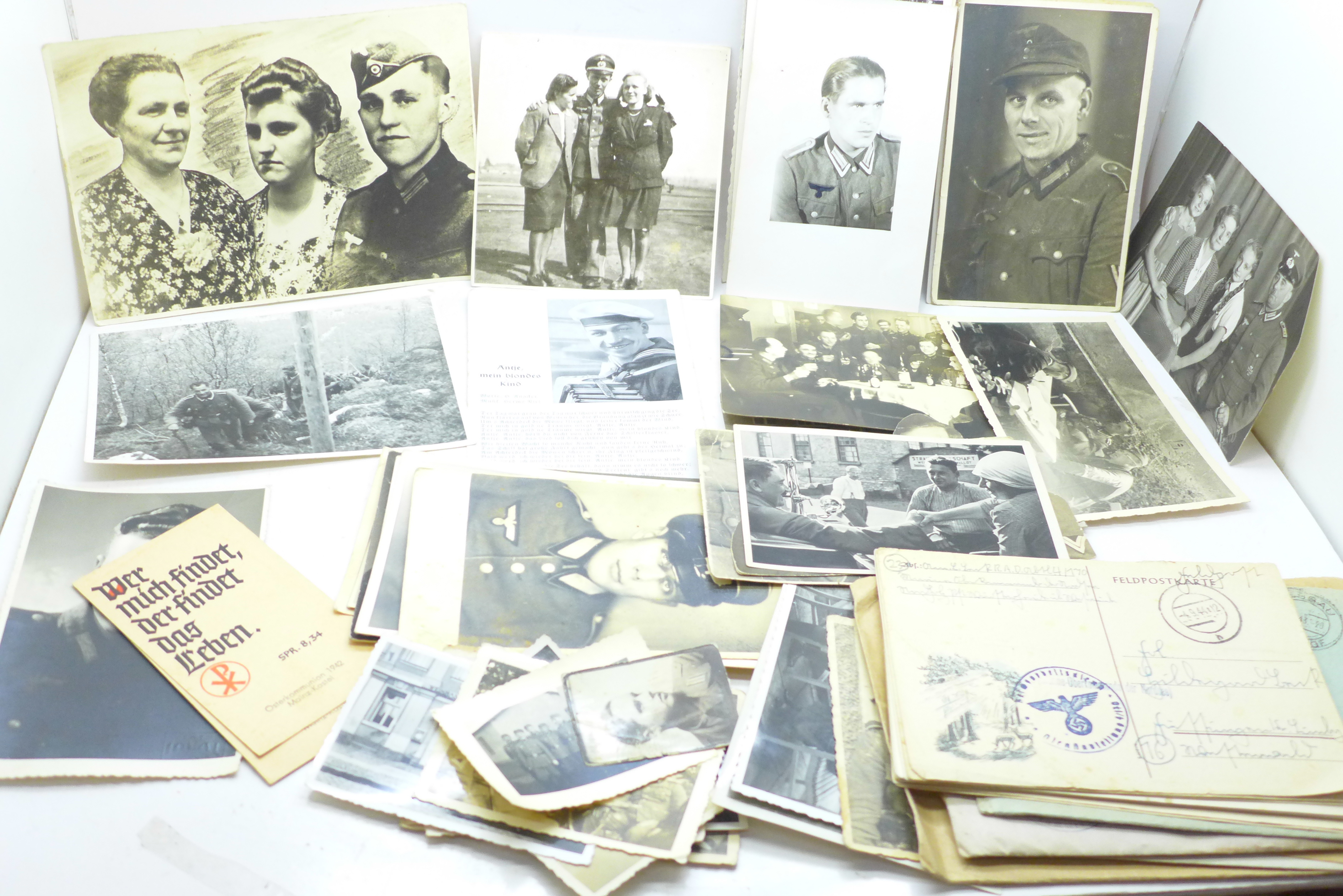 Twenty-six WWII German photographs and twenty-five postcards, six letters and two Osterkommunion