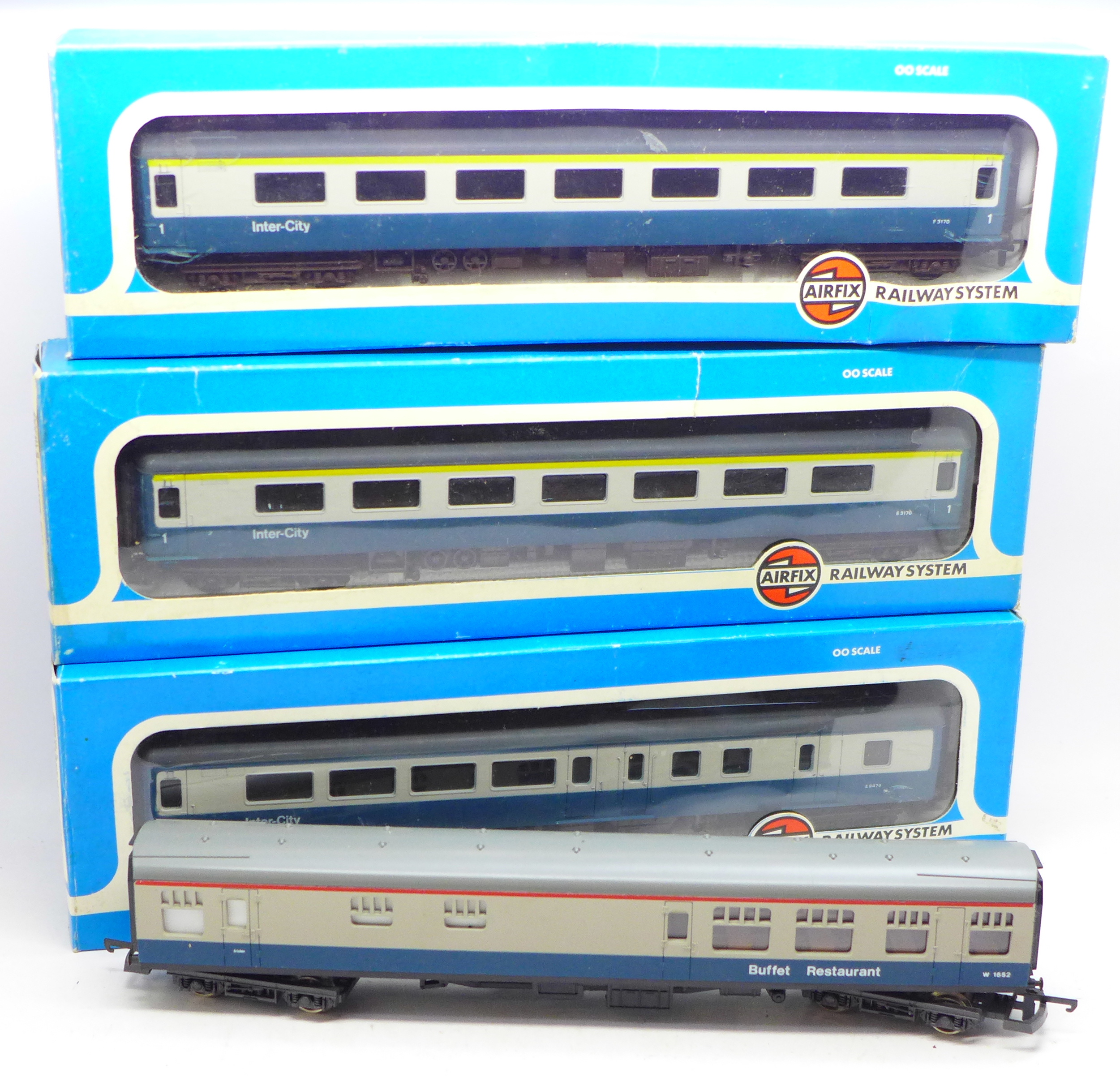 Three Airfix System 00 scale 'Inter City' coaches, boxed and a Lima coach