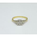 An 18ct gold and platinum set diamond ring, 2.3g, L