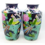 A pair of Japanese famille noir vases, 24cm
