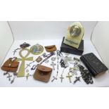 A collection of religious items including eight roseries, prayer book, medallions and an onyx Virgin
