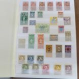 An album of revenue stamps - loose and on complete documents