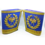 A pair of military brassard armlets, one marked Toye & Co. Ltd