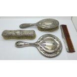 A silver mirror, Birmingham 1912 and a silver hair brush, both a/f, a silver comb and silver clothes