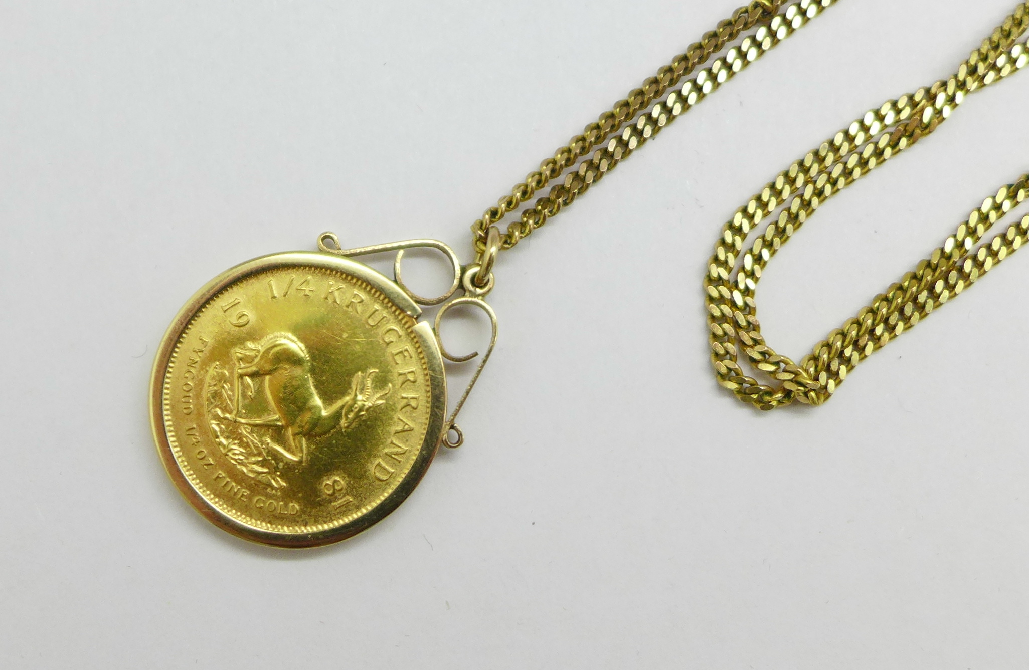 A ¼ Krugerrand, 1981, in a 9ct gold mount and on a 9ct gold chain, total weight 17.0g, chain 61cm - Image 2 of 3