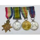 A group of four WWI medals including RN Royal Navy British Royal Fleet Reserve Long Service & Good