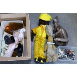 A felt doll, a soft toy rabbit, lead figures, etc.