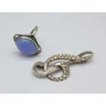 An Arts & Crafts silver ring set with chalcedony, L, and a treble clef brooch marked silver