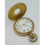 A Waltham Traveler gold plated half-hunter pocket watch