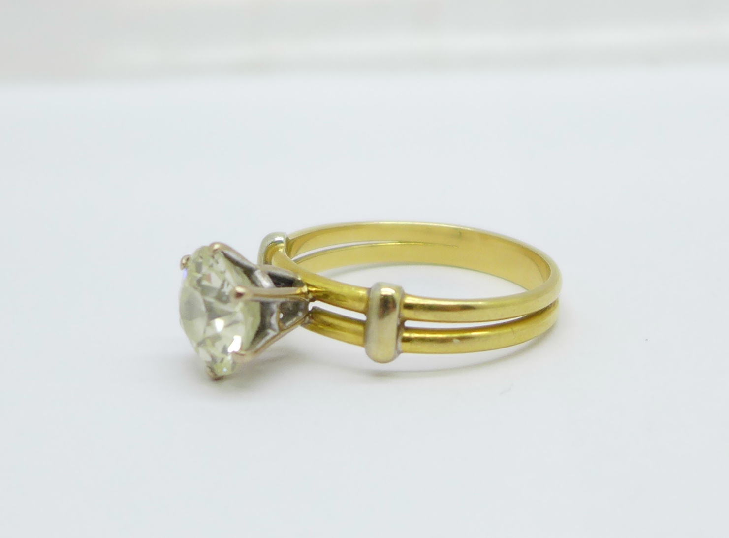 A solitaire diamond ring, approximately 3.3carat weight, set in yellow metal - Image 2 of 5