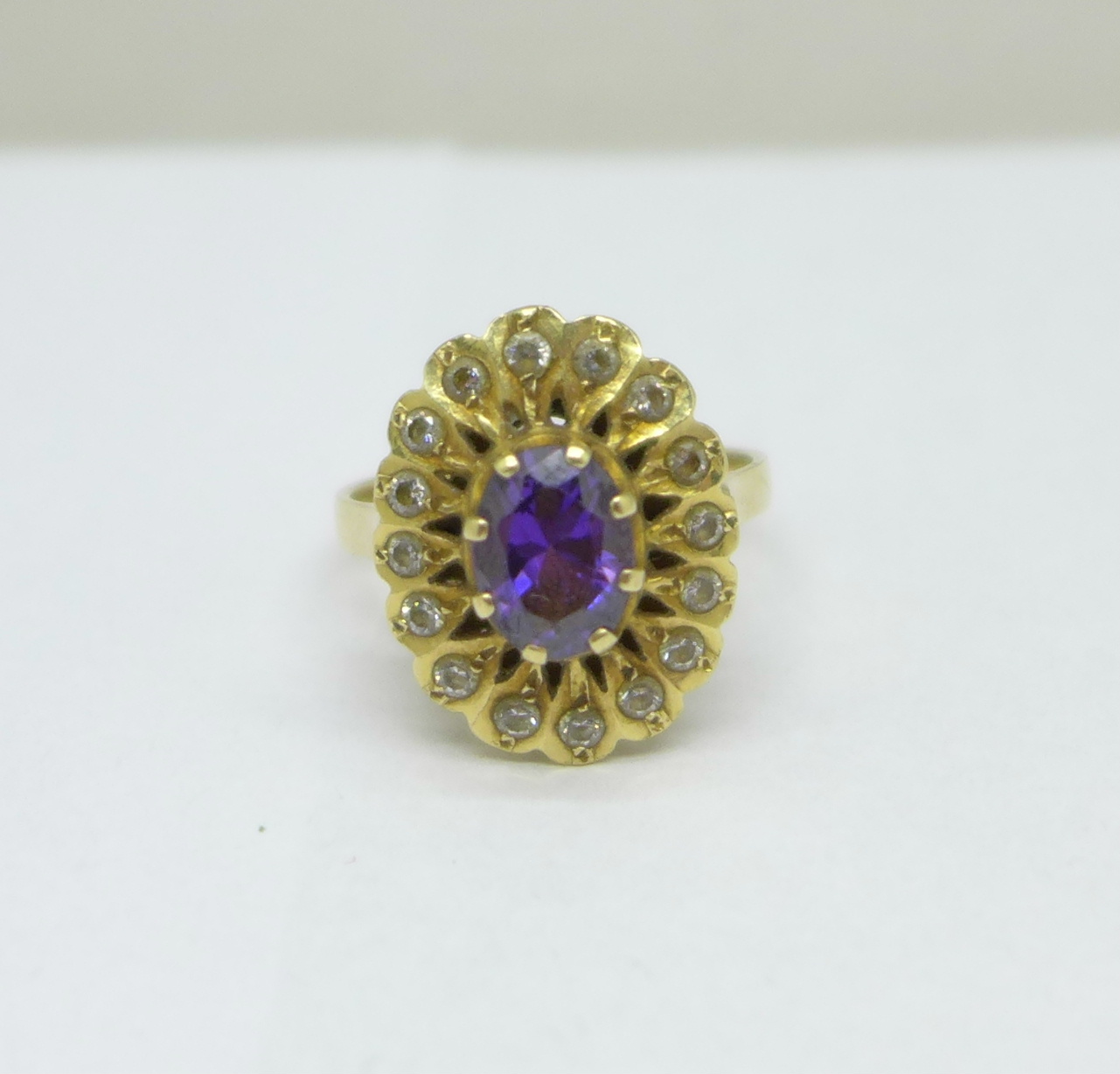 A 14ct gold, amethyst and white stone ring, 5.4g, O