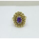 A 14ct gold, amethyst and white stone ring, 5.4g, O