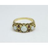 A 9ct gold, opal and garnet ring, 3.4g, O