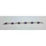 A modern silver Celtic knot and Blue John bracelet, one panel a/f