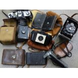 Five cameras; Voightlander Compur, Aldis Uno Anastigmat, Kodak Brownie, Hankeye Ace de Luxe,