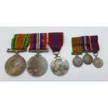 A WWII medal group with Queen Elizabeth II Coronation medal with a set of medal miniatures
