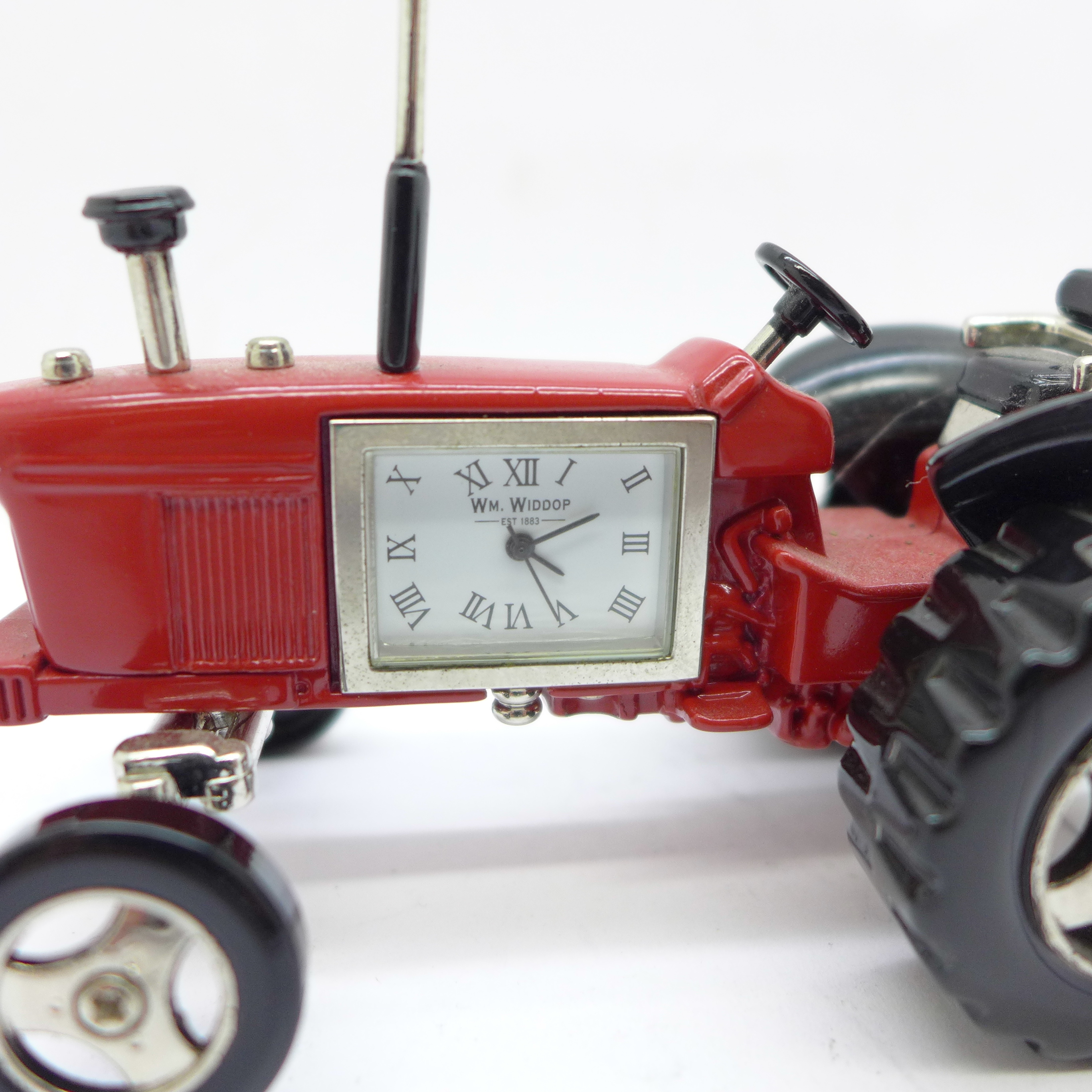 A small novelty desktop tractor set with a timepiece marked William Widdop, length 10cm - Image 2 of 4