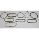 Seven silver bracelets and two silver bangles, 149g