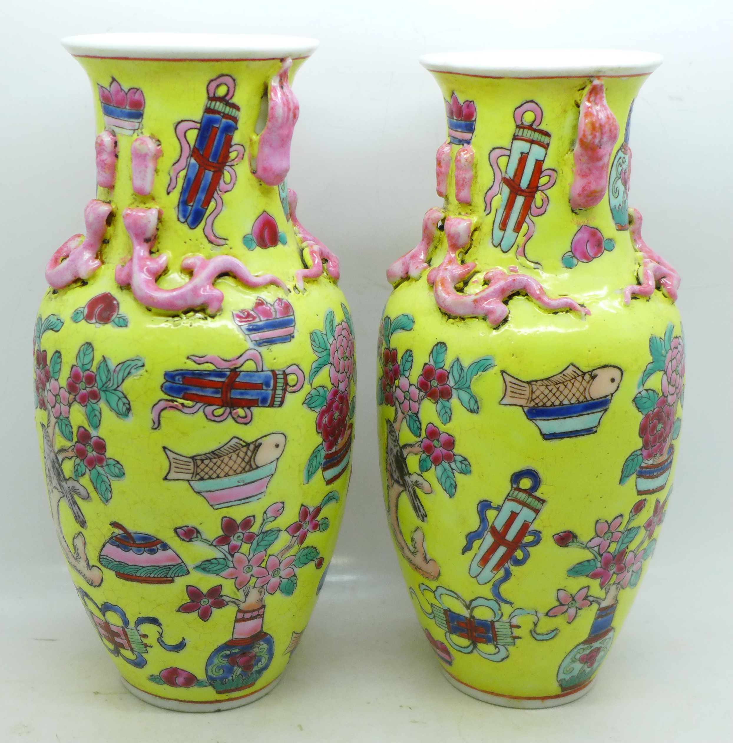 A pair of Chinese vases, 21.5cm, crazed