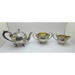 A small late Victorian silver three piece tea service, London import mark for 1897, Eustace George