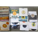 A box of 45rpm 7" vinyl singles
