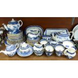 A Booths Real Old Willow tea and dinner service, including six dinner plates, eight medium plates,