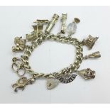 A silver charm bracelet, 76g