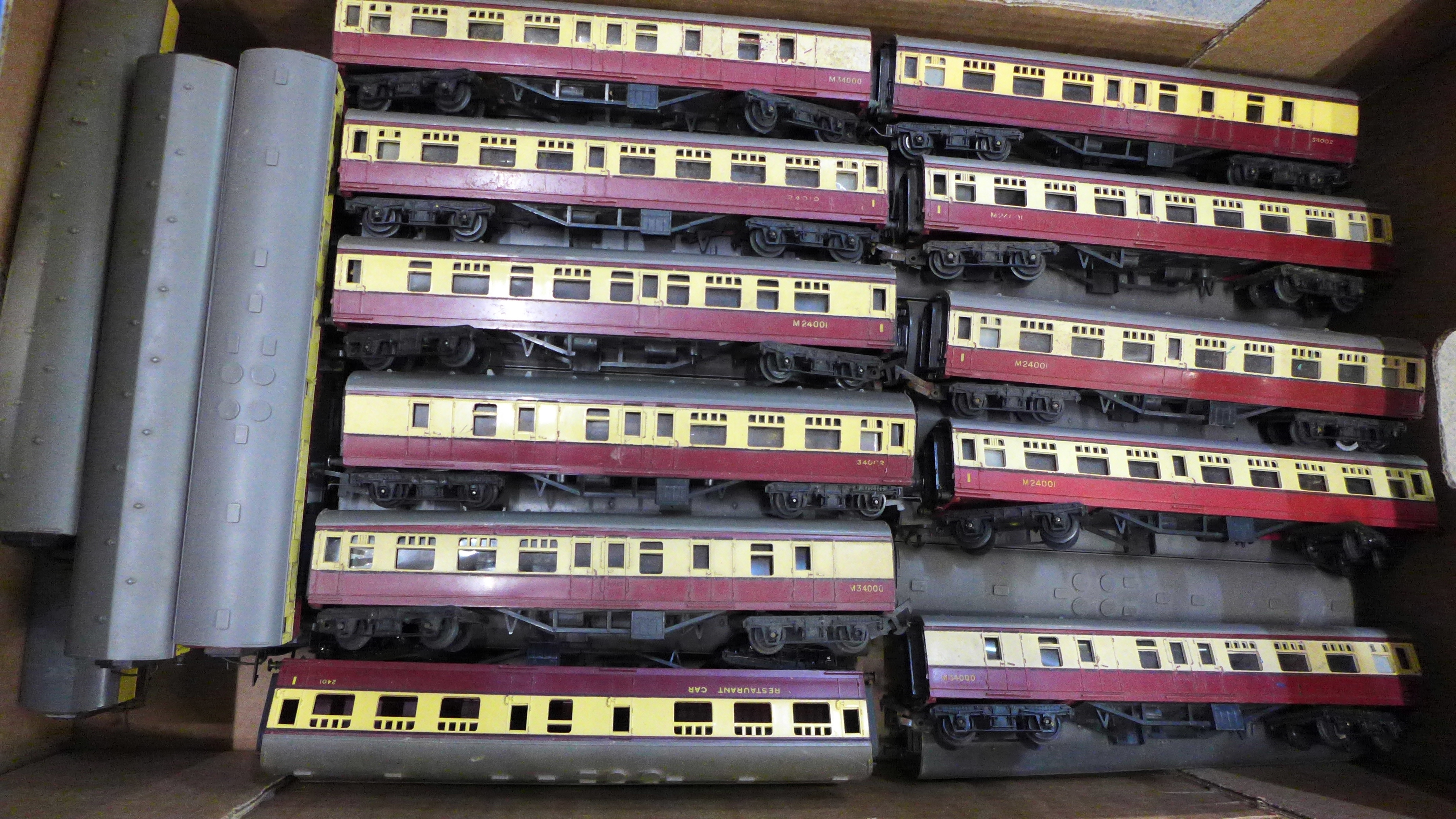 Thirty-two Tri-ang OO gauge model rail carriages