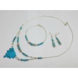 A turquoise coloured jewellery set