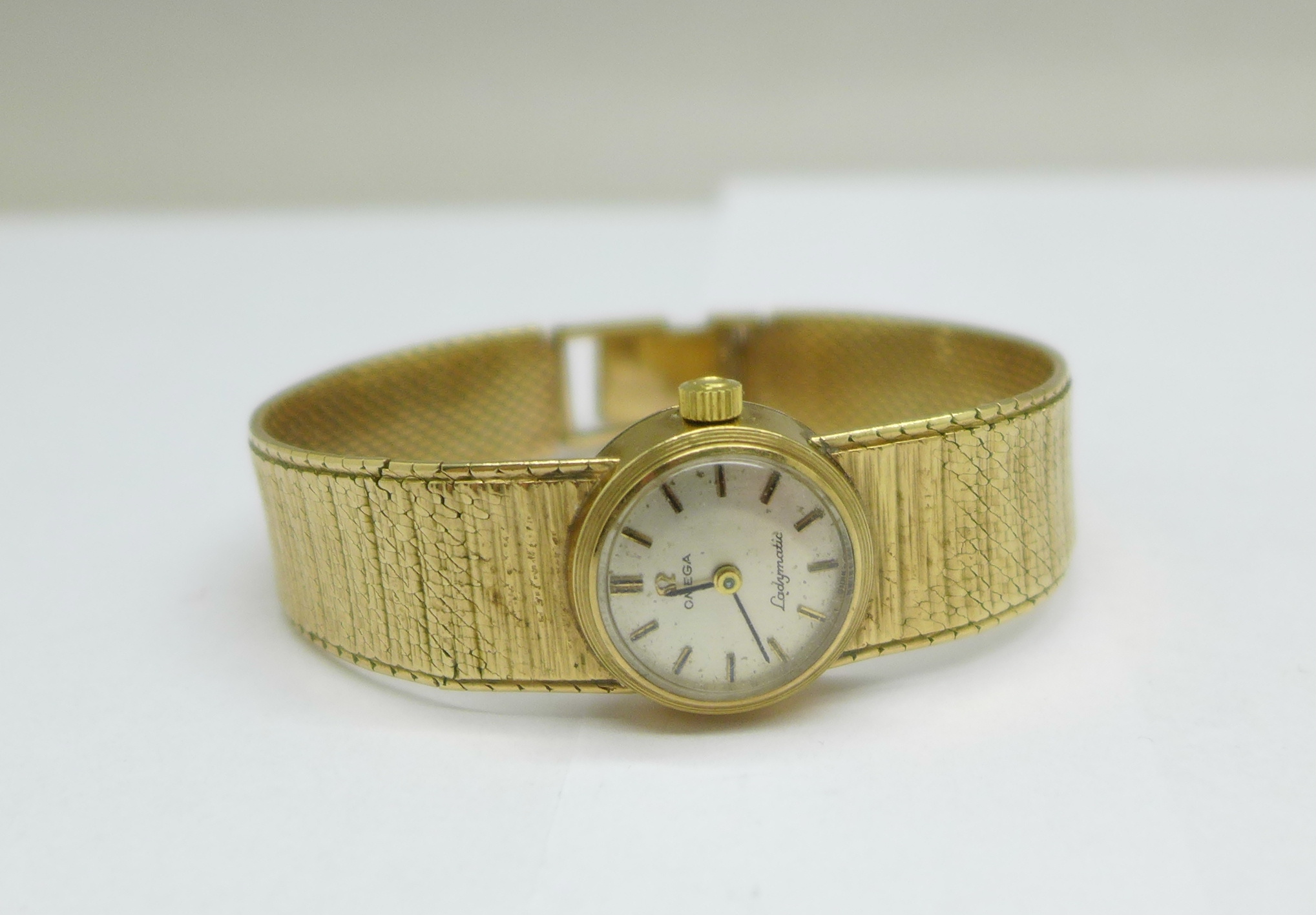 A lady's 9ct gold Omega Ladymatic wristwatch, total weight with movement 30g - Image 6 of 6