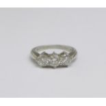 A platinum set three stone diamond ring, 6g, size P/Q, over 1 carat total weight diamond