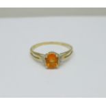 A 9ct gold, fire opal and diamond ring, 1.7g, T