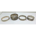 Four hallmarked silver bangles including one buckle style by Charles Horner, 119g, back of widest