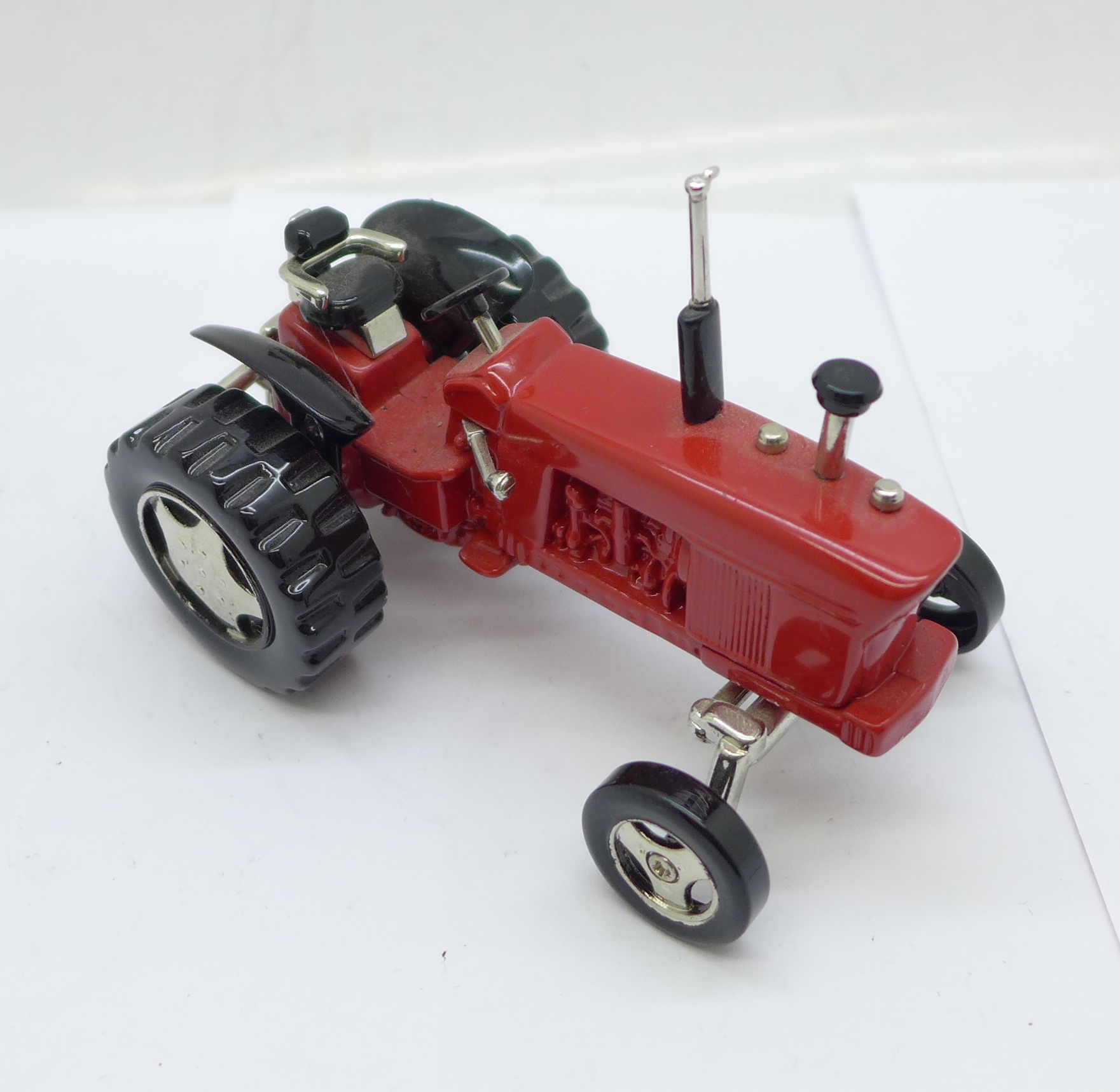 A small novelty desktop tractor set with a timepiece marked William Widdop, length 10cm - Image 4 of 4