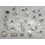 A collection of silver earrings